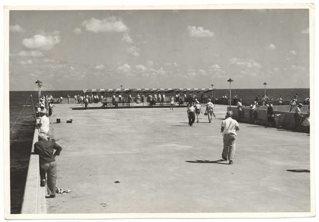 People Walking Fishing and Relaxing the pier at Friendship Corner