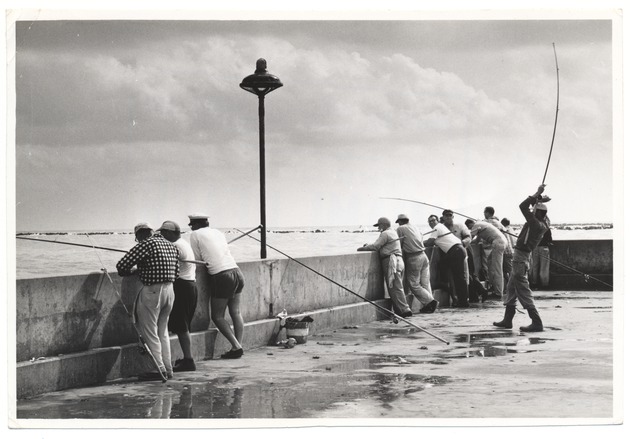 Fishing off the Pier at Friendship Corner on a Cloudy Day