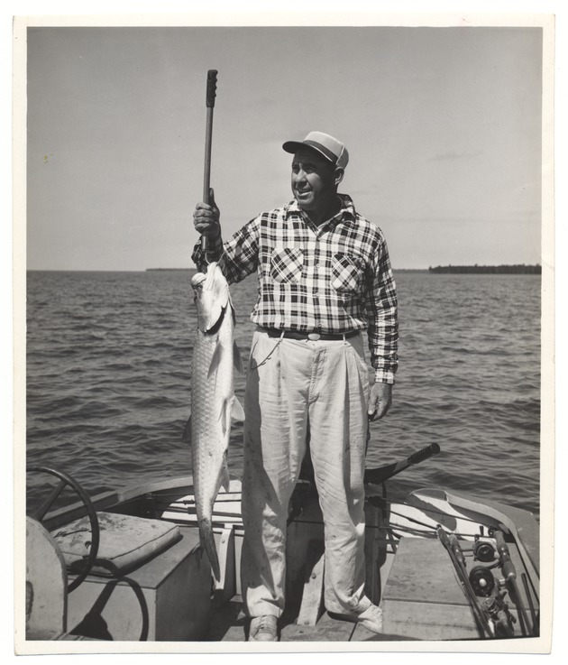 Man with a fresh caught fish