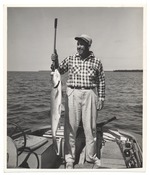 Man with a fresh caught fish