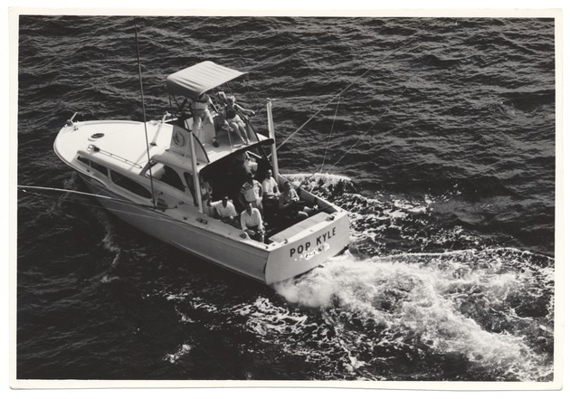 Men fishing from the "Pop Kyle"