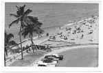 Parking lot and beach at Ocean Terrace and 73rd Street, looking south