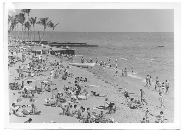 Beachgoers and piers at Ocean Terrace - Recto Photograph