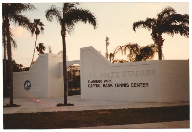 Gated entrance to Flamingo Park - Photograph, recto: [Flamingo Park entrance. Abel Holtz Stadium and Capital Bank Tennis Center]