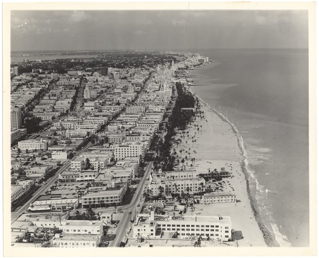 Aerial view looking north from 4th Street, 1964 - Photograph: recto, [Looking north from 4th Street, aerial view of Ocean Drive]