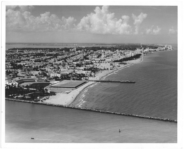 Aerial view looking north from Government Cut showing Greyhound Racetrack in South Shore, 1964 - Photograph, recto: [Looking north from Government Cut, 1964]