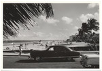 Cars in front of the beach, October 1954