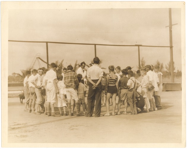 Flamingo Park sports activities, 1932 - Photograph, recto: [Marble game at Flamingo Park, 1929]