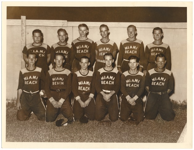 Greater Miami baseball champions at Flamingo Park, 1936 - Photograph, recto: [Greater Miami baseball champions at Flamingo Park. First row, kneeling, left to right: Jimmy Cox, Jimmy Day, Art Frisch, Vernon Burrell, Ted Norris, Jay Gerbus. Second row: Tommy Bush, Roy Fairfield, Bob Ryder, Jack Hathaway, Charles Maxwell, Jerry Dowdy.]