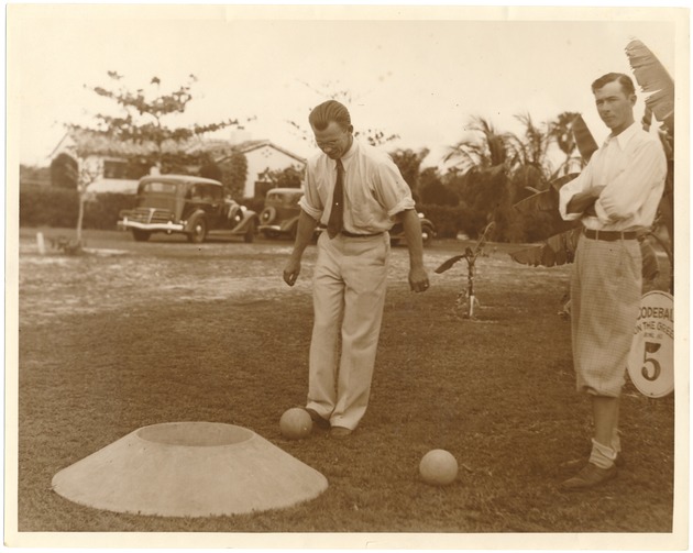 Bobby Dosh and B.C. Wheeler playing codeball at Flamingo Park, 1934 - Photograph, recto: [Bobby Dosh and B.C. Wheeler playing codeball at Flamingo Park, 1934]
