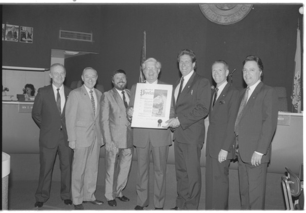 Miami Beach award ceremony scenes, 1970s and 1980s - Negative: [Mayor Alex Daoud presenting a proclamation]
