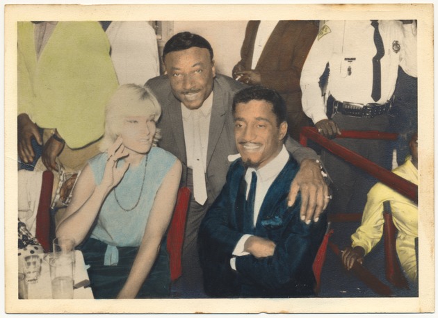 1950s celebrity scenes: Sammy Davis, Jr., Joey Heatherton, Clyde Killens and Althea Gibson - Photograph, recto: [Hand painted [Clyde Killens, Sammy Davis, Jr., and friends at unknown club, 1955]