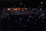 Conference crowd, screen reads "NEA Mobilizers for Action