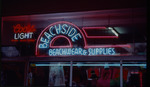 Night scene of Beachside Beachwear & Supplies