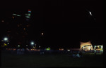 [1980/1995] Night scene of a crowd at the bandshell