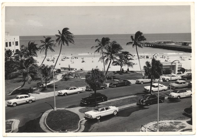 Ocean Drive, Lummus Park promotional photographs, 1950s - Photograph, recto: [Beach scene showing Ocean Drive, Lummus Park, and South Pointe Park, May 1955]
