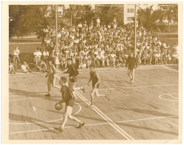 Boys intramural basketball game at Flamingo Park - Photograph, recto [Boys' intramural basketball game at Flamingo Park]