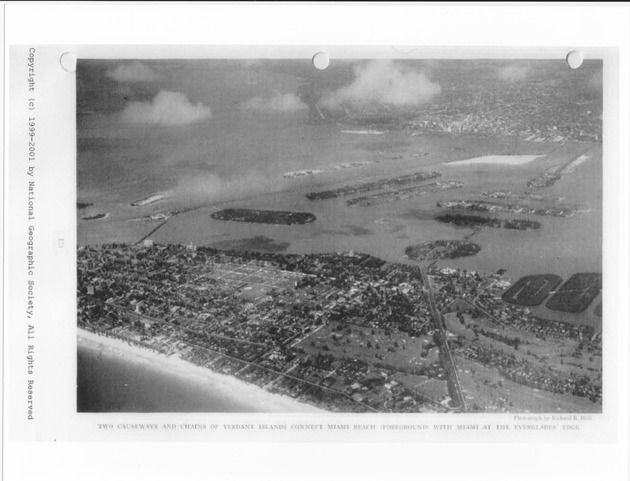 Miami and Miami Beach, ca. 1890-1930 - Photograph, recto: Two causways and chains of verdant islands connect Miami Beach (forground) with Miami at the Everglades' edge