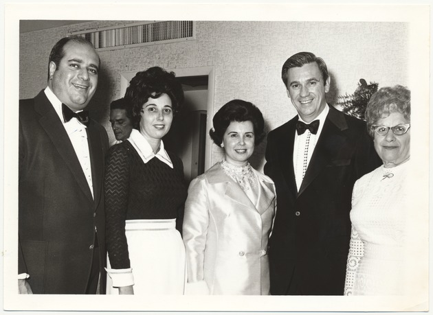 Miami Beach Mayor Dermers' annual Mother's Day brunch - Photograph, recto: [Mayor Jay and Yaffa Dermer with guests at their annual Mother's Day brunch for elderly mothers without local family, ca. 1970]