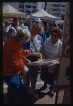 Women looking at art at Miami Beach Festival of the Arts