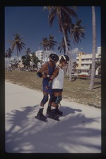 Two people rollerblading at Lummus Park