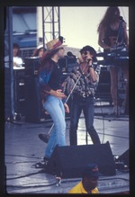 Bon Jovi and another performer on stage