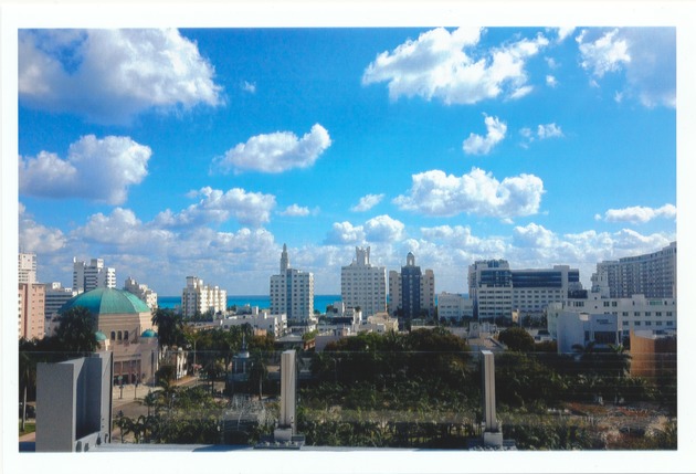 Miami Beach and speech given by Mayor Levine during the Miami Beach Centennial, 2015 - Photograph, recto: [View of Miami Beach from atop the New World Symphony. Seen from left to right: DecoPlage Condominiums, The Ritz Carlton, The Sagamore, The National, The Delano, The SLS, The Surfcomber and Temple Emanu-El in front right, 2015]