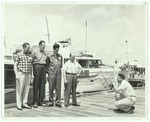 Men getting their photo taken