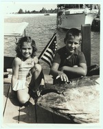 Children pose with a large fish