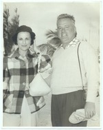 Woman in plaid shirt with Man