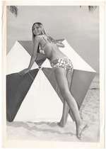 Dominique Doherty posing with an umbrella