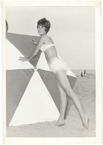 Pat Thomas pushing an umbrella