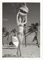 Melinda Brady with a beach ball over her head