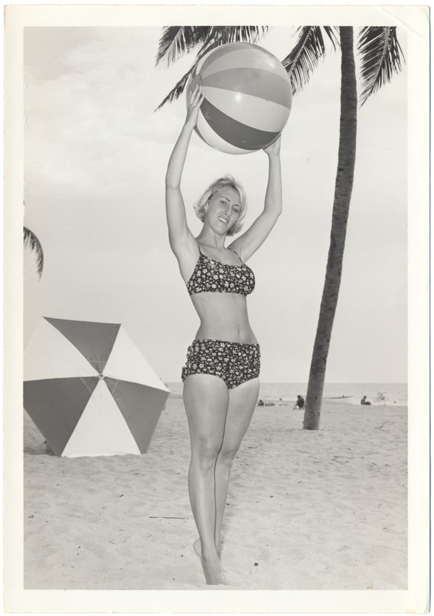 Diane Edney with a beach ball and an umbrella - 