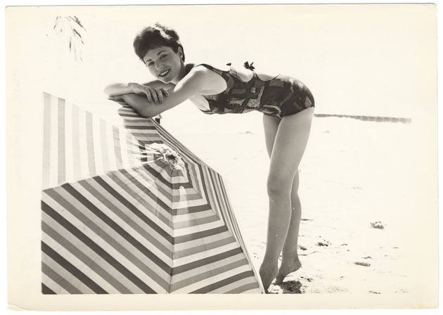 Louise Richman beniding on to an umbrella - 