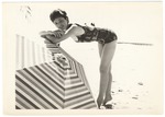 Louise Richman beniding on to an umbrella