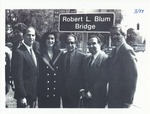 Community leaders posing at the dedication of the Robert L. Blum Bridge