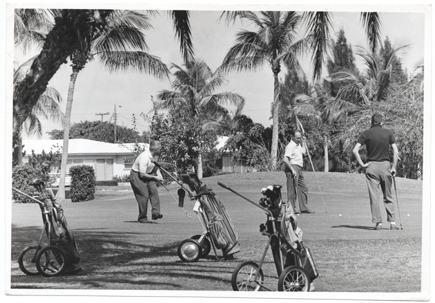 Golfers at Bayshore Golf Course - Photograph, recto: [Men golfing, January 1960]