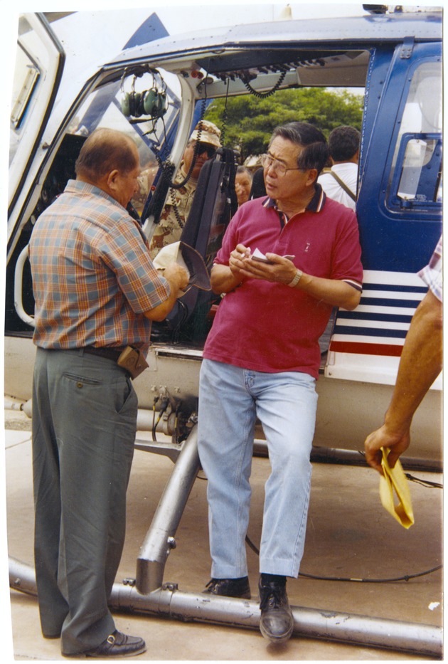 Ica, Peru Reconstruction and requests for support - Photograph, recto: [Mayor of Ica Oscar Sanchez Dulanto and the President of the Republic Ing. ? Alberto Fujimori. Coordinating the reconstruction of Ica April 1999]