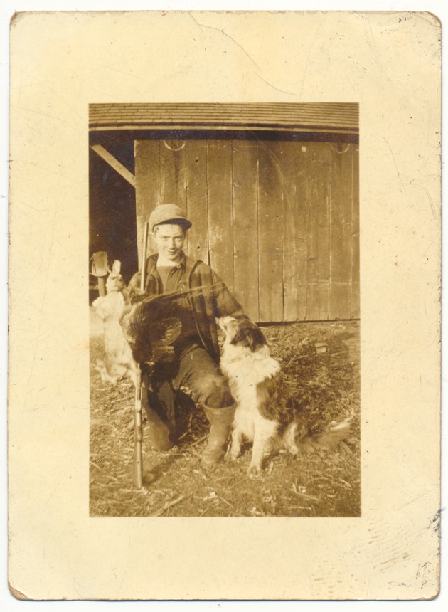 Boy posing with dog - 