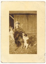 Boy posing with dog