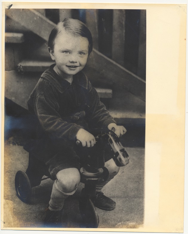 Child on tricycle - 