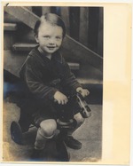 Child on tricycle