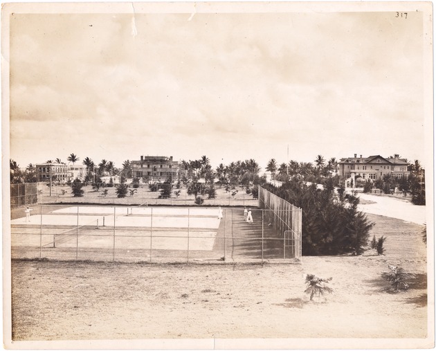 Miami Beach 1900-1940 - Photograph, recto: [View of Lincoln Road, tennis court, and Carl Fisher's house on the far right].