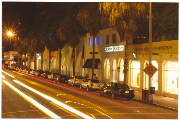 Collins Avenue during the day and at night in the mid 1990s - Photograph, recto: [View of Collins Avenue at night]