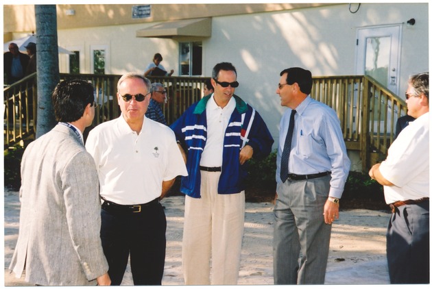 Ribbon Cutting Ceremony at the Miami Beach Golf Course, 2004 - Photograph, recto: [View of city officials and invitees to the Ribbon Cutting Ceremony at the Miami Beach Golf Course in 2004]