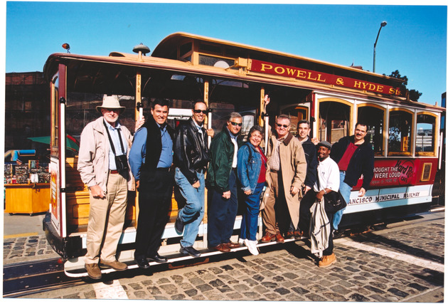 Members of the Miami Beach City Commission in San Francisco posing in front of trolley - 