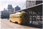 Tram at a stop, San Francisco, California