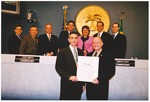 Neil Fritz accepting certificate for acting As Executive Director For North Beach Development Corporation