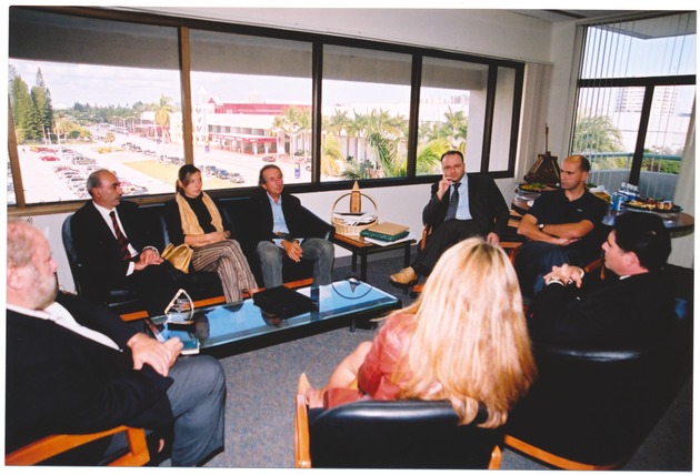 Miami Beach Mayor David Dermer with Guests Around Coffee Table